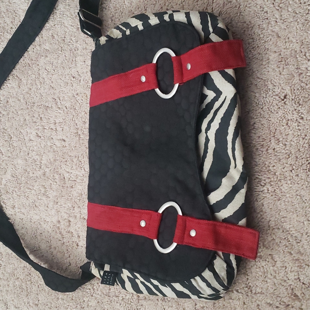 1154 Lill Studio Messenger bag. Shows some usage on the back but is great.